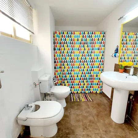 Quarto em Acomodações Particulares Gloria Host House