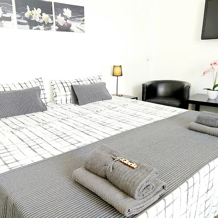 Quarto em Acomodações Particulares Gloria Host House
