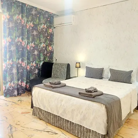 Quarto em Acomodações Particulares Gloria Host House *