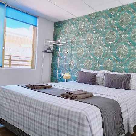 Quarto em Acomodações Particulares Gloria Host House *